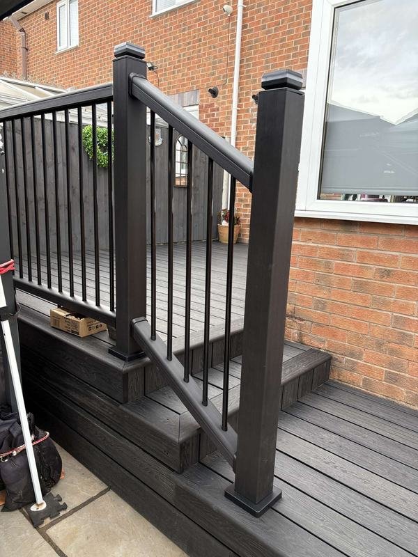 Composite balustrade posts and handrail on a raised deck in Abenbury, Wrexham