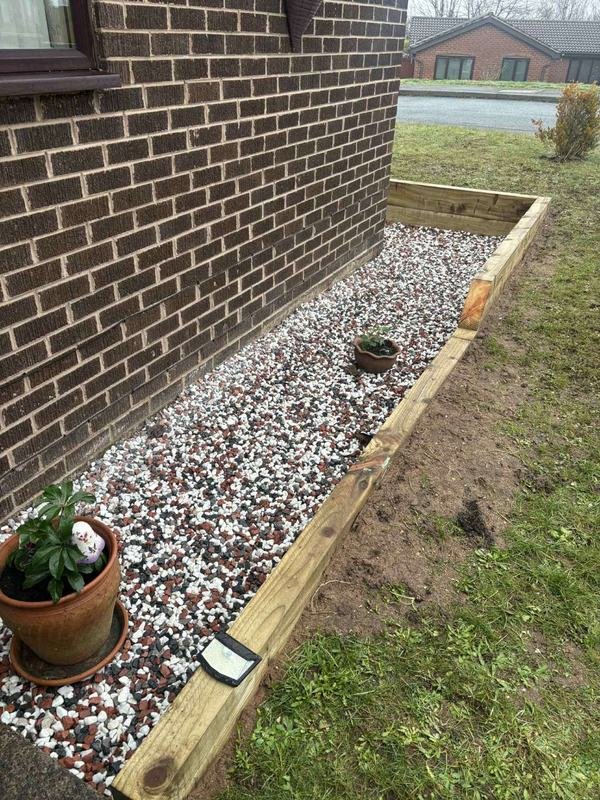 Sleeper retaining bed and gravel finish in Borras, Wrexham