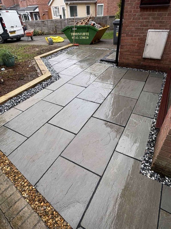 Kandla grey Indian stone path with a pebble border after a full garden renovation in Bersham, Wrexham
