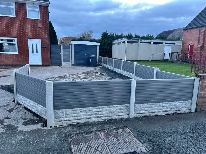 Grey composite fence panels and a steel-framed bespoke gate in Pen-y-Cae, Wrexham