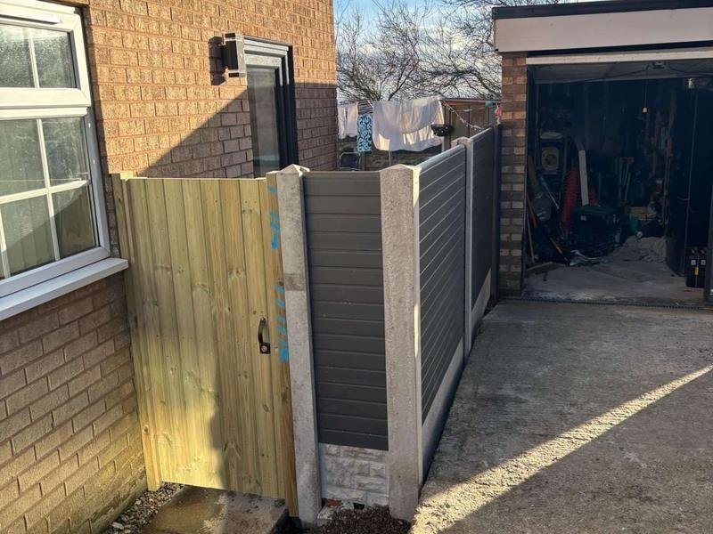 Fence extension and a new timber gate securing a side passage in Coedpoeth, Wrexham