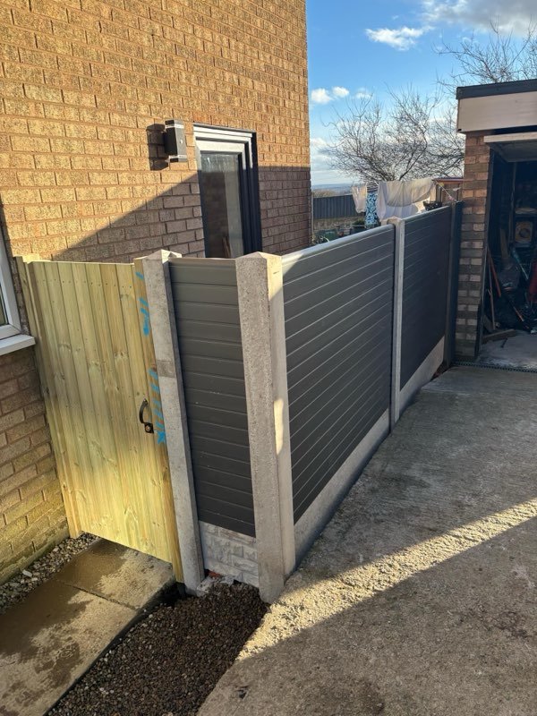 Fence extension and a new timber gate securing a side passage in Coedpoeth, Wrexham