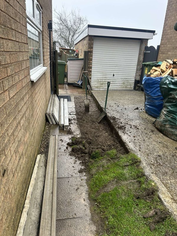 Fence extension and a new timber gate securing a side passage in Coedpoeth, Wrexham