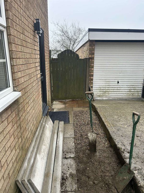 Fence extension and a new timber gate securing a side passage in Coedpoeth, Wrexham