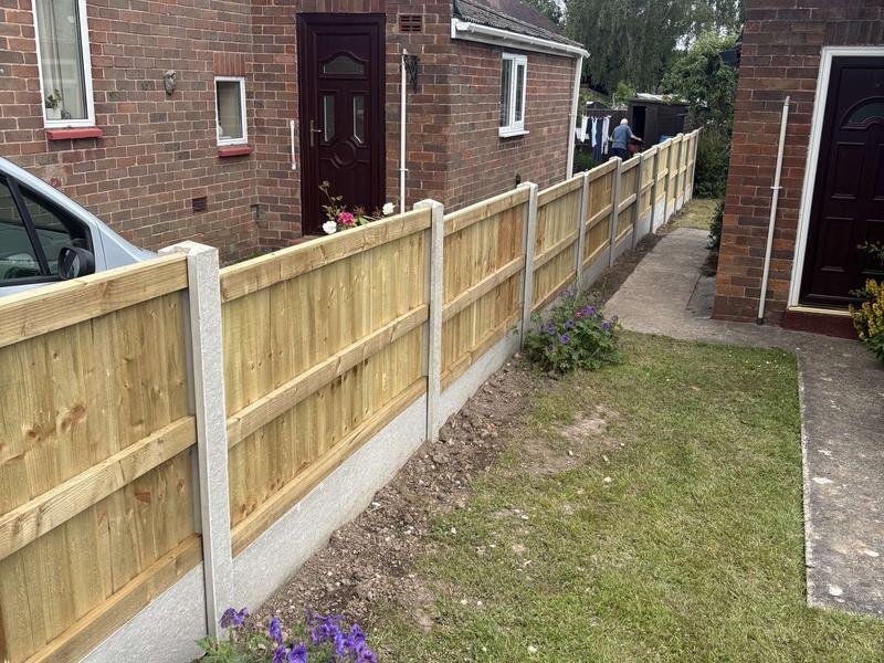 Feather edge fence panels on concrete posts and gravel boards in Ellesmere, Shropshire