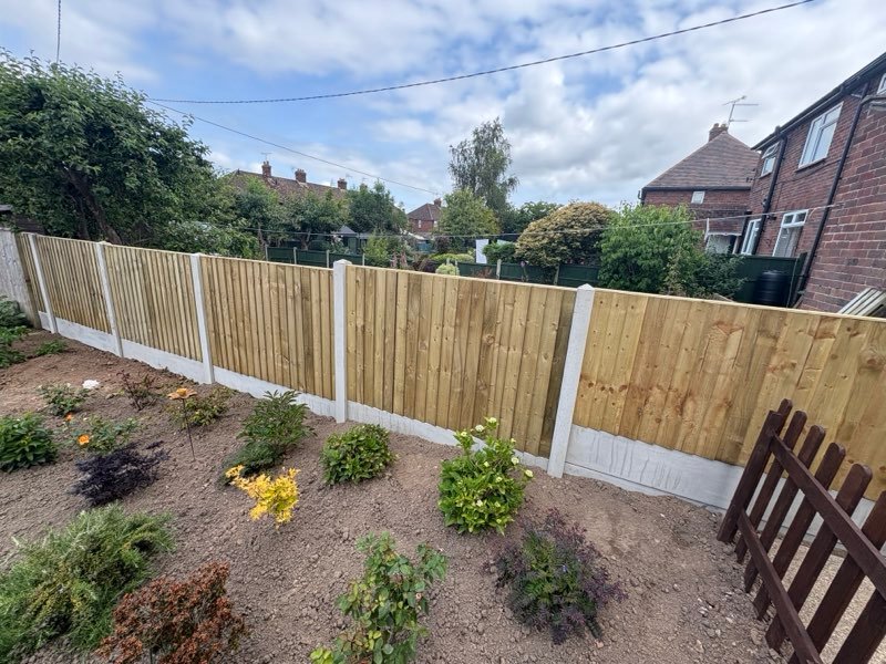 Feather edge fence panels on concrete posts and gravel boards in Ellesmere, Shropshire