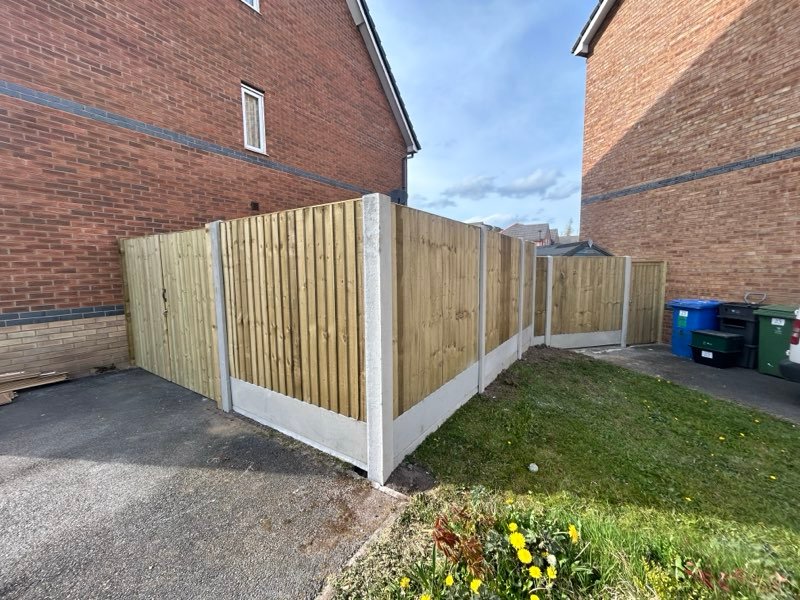 Feather edge fencing with concrete posts and bespoke timber gates in Brymbo, Wrexham