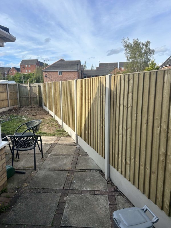 Feather edge fencing with concrete posts and bespoke timber gates in Brymbo, Wrexham