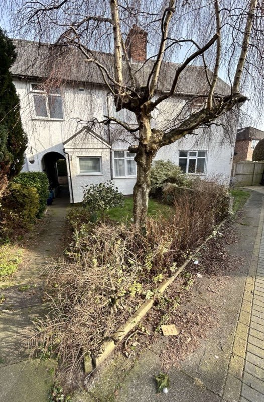 Front garden landscaped with decorative Black Ice gravel in Wrexham