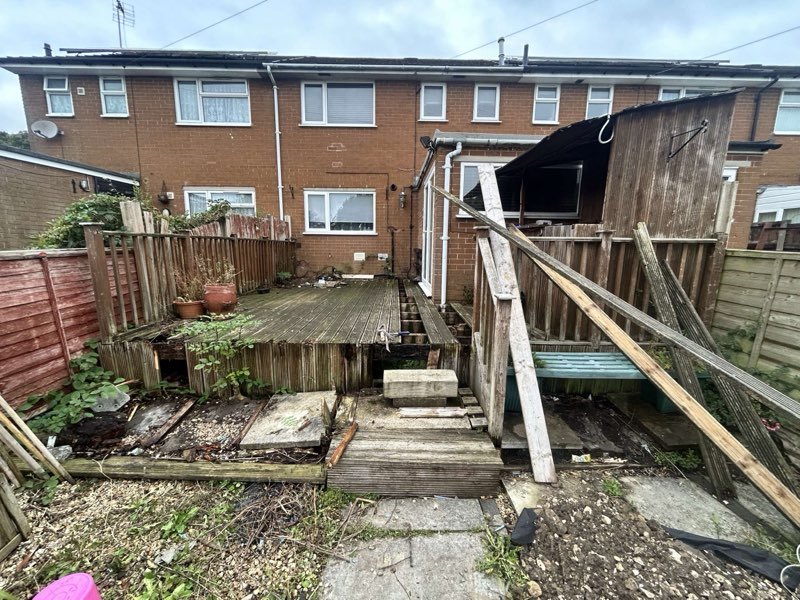 Grey composite decking with aluminium balustrades replacing an old timber deck in Tan-y-Fron, Wrexham