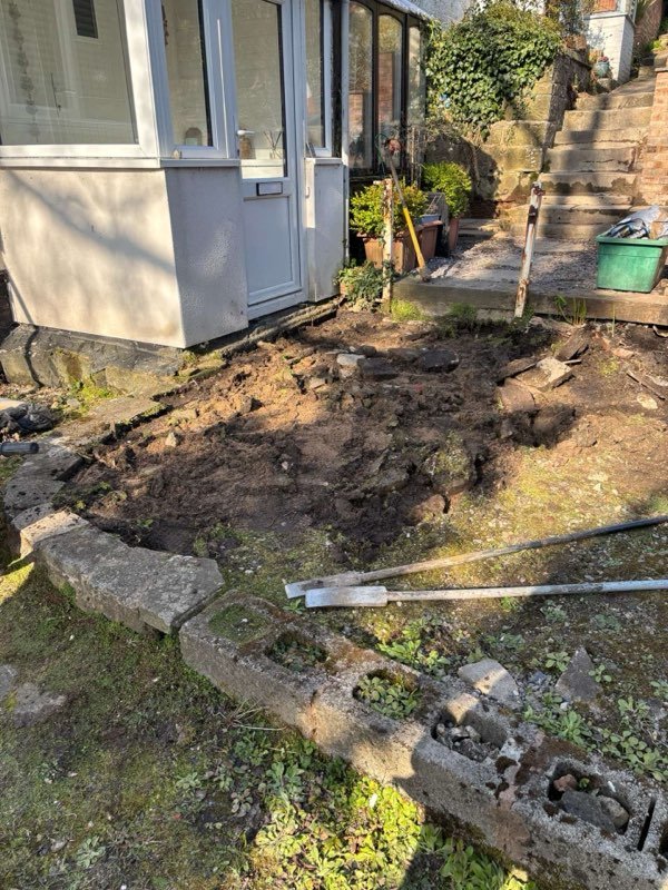 Kandla grey Indian stone patio with charcoal setts and KL kerbs in Bersham, Wrexham