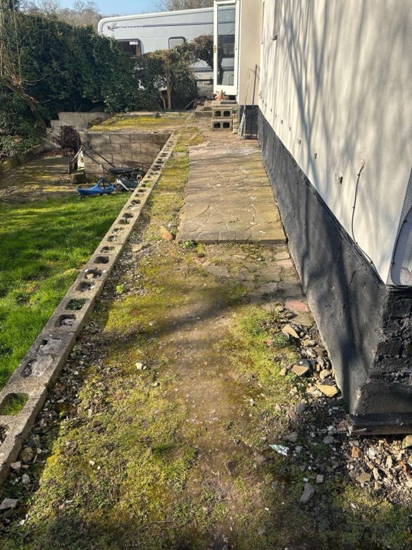 Kandla grey Indian stone patio with charcoal setts and KL kerbs in Bersham, Wrexham