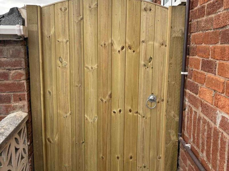Custom arched tongue and groove timber gate fitted in Acrefair, Wrexham
