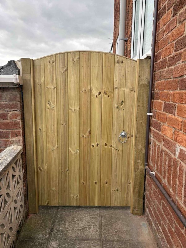 Custom arched tongue and groove timber gate fitted in Acrefair, Wrexham
